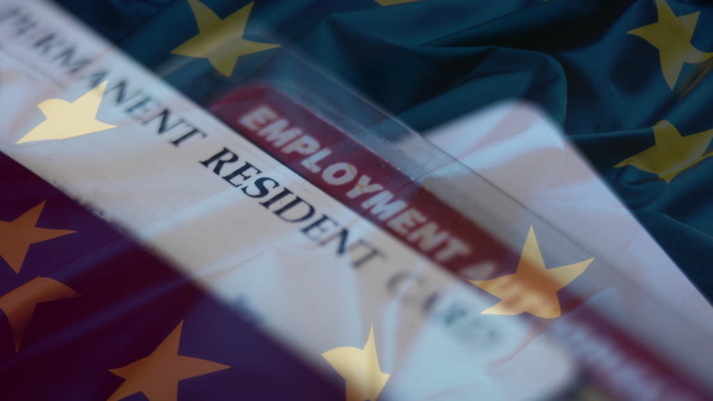 Close-up of an Employment Resident document with European Union stars in the background, symbolizing EU work authorization.